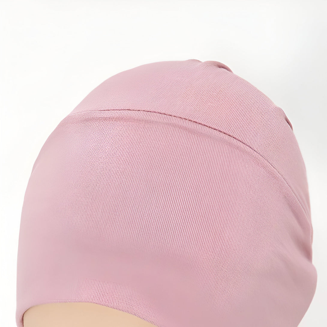 Bonnet en coton rose pour femme musulmane. Ce bonnet est parfait pour un look élégant et confortable.