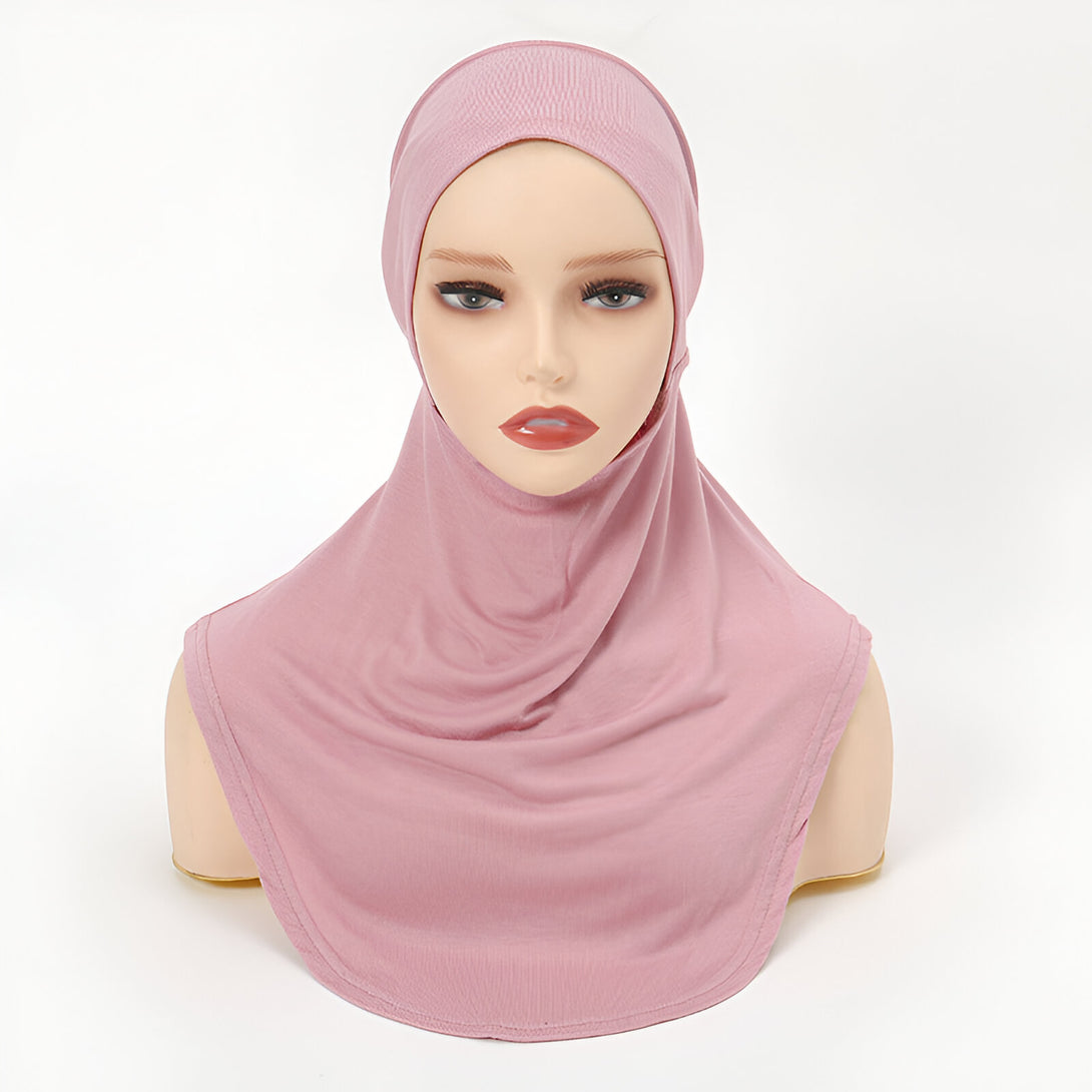 Hijab rose en jersey extensible pour femmes musulmanes, parfait pour un style moderne et confortable.