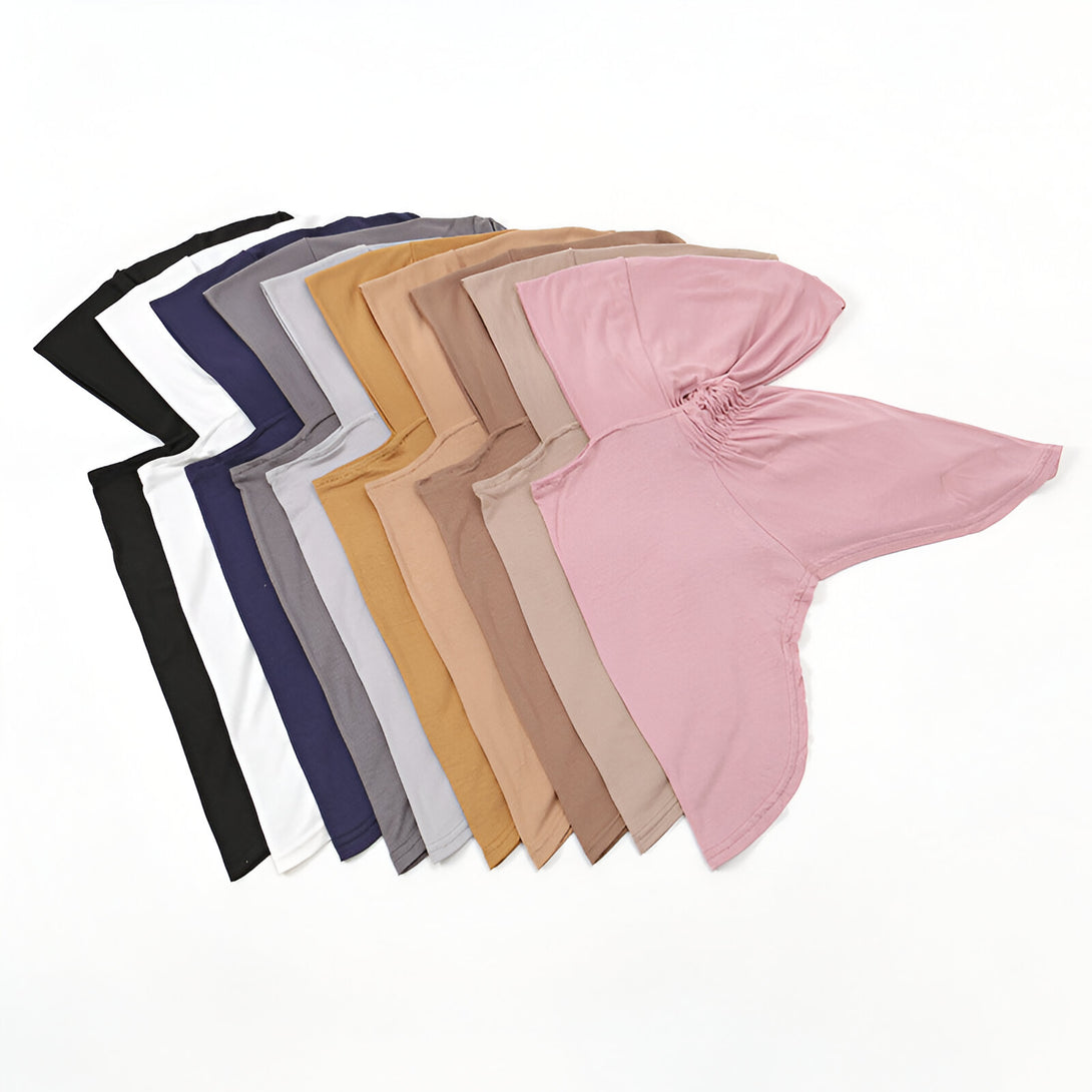 Une variété de bonnets de hijab en jersey extensible dans différentes couleurs, parfaits pour un look élégant et confortable.
