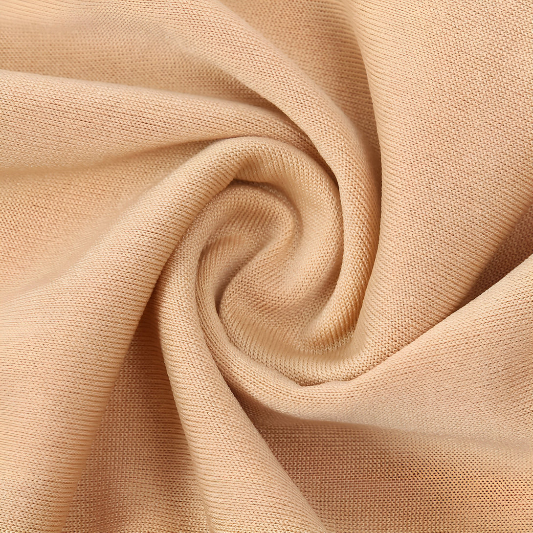 Tissu beige doux et confortable, idéal pour la confection de vêtements musulmans.