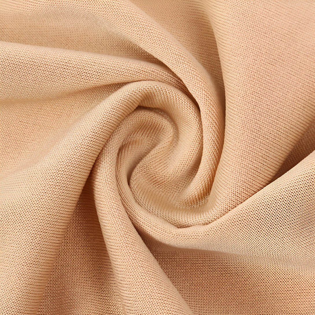 Tissu beige doux et confortable, parfait pour les vêtements musulmans.
