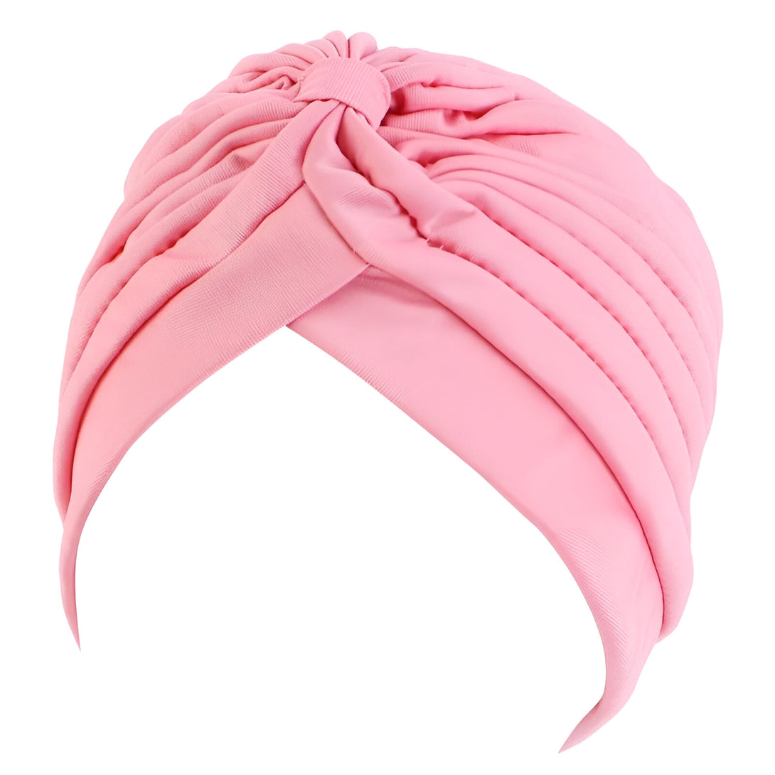 Un turban rose en tissu doux et confortable, parfait pour un look élégant et moderne.  Idéal pour compléter une tenue musulmane.