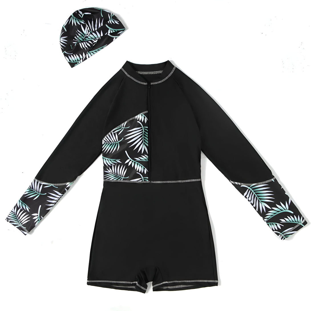 Combinaison de bain musulmane noire à manches longues avec un motif de feuilles tropicales et un bonnet assorti.