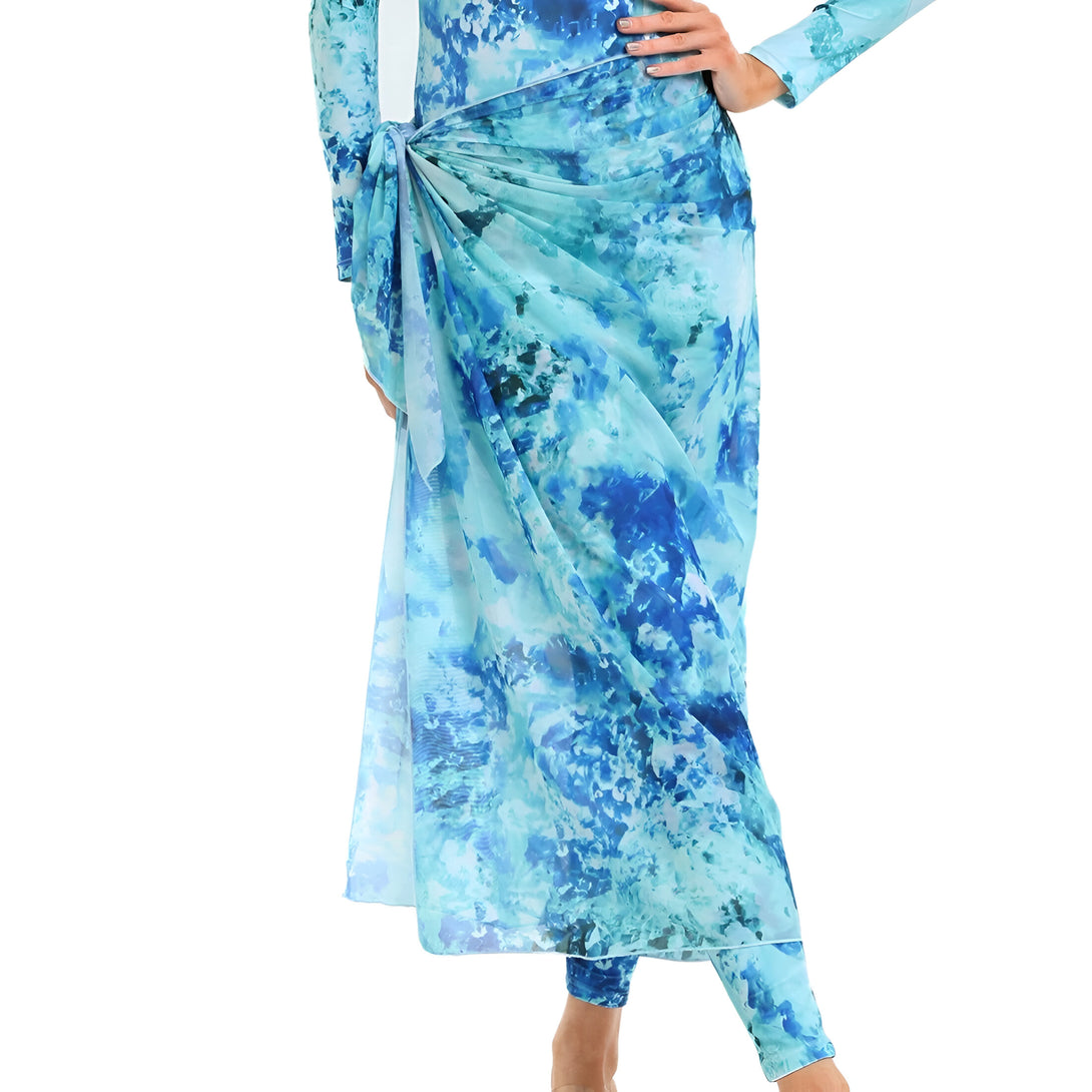 Une jupe longue en mousseline de soie à imprimé bleu ciel, idéale pour les femmes musulmanes qui recherchent un look élégant et confortable.