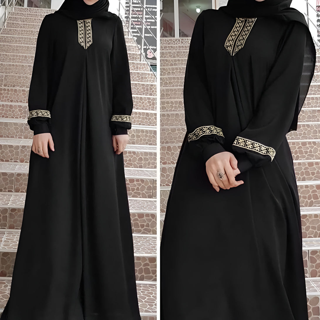 Deux femmes portant des abayas noires élégantes avec des détails dorés. Les abayas sont longues et amples, parfaites pour une tenue modeste et chic.