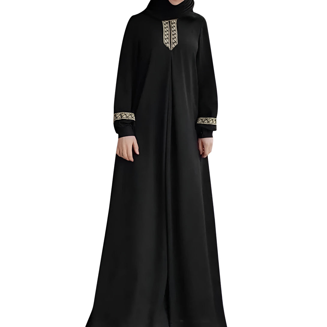 Une robe noire longue à manches longues pour filles avec des détails dorés brodés. La robe est parfaite pour les occasions spéciales ou pour un usage quotidien.
