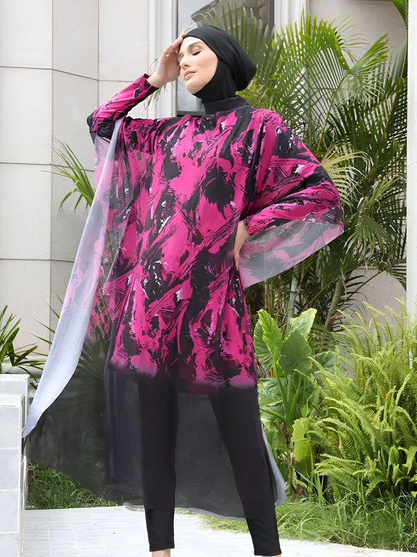 Une femme portant un maillot de bain musulman rose et noir avec un hijab noir.