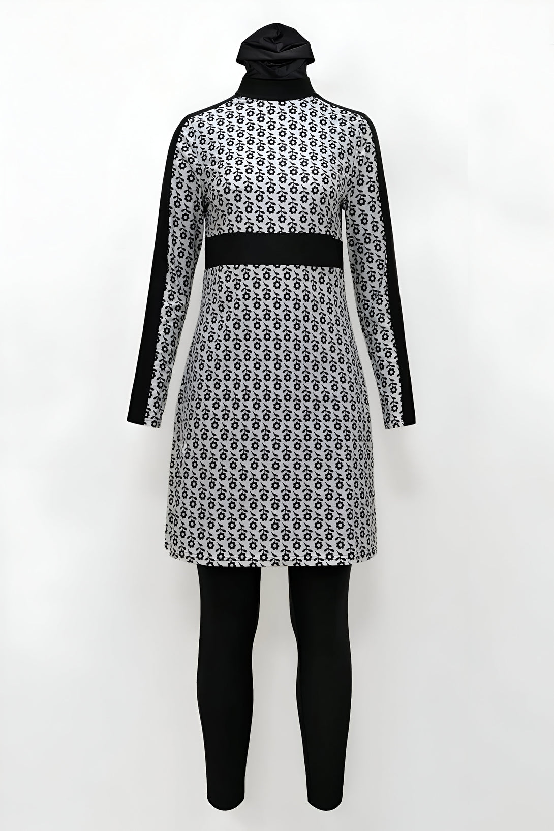 Maillot de bain musulman pour femmes avec un motif floral noir et blanc. La tenue comprend une robe longue à manches longues et un legging.