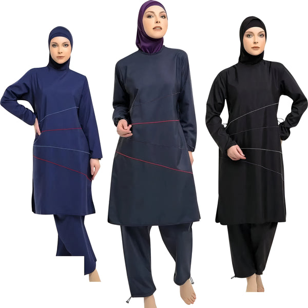 Trois femmes portant des maillots de bain islamiques, un bleu foncé, un bleu marine et un noir, avec des détails de couture rouges.  Les maillots de bain sont longs et couvrent tout le corps.  Les femmes portent également des hijabs.