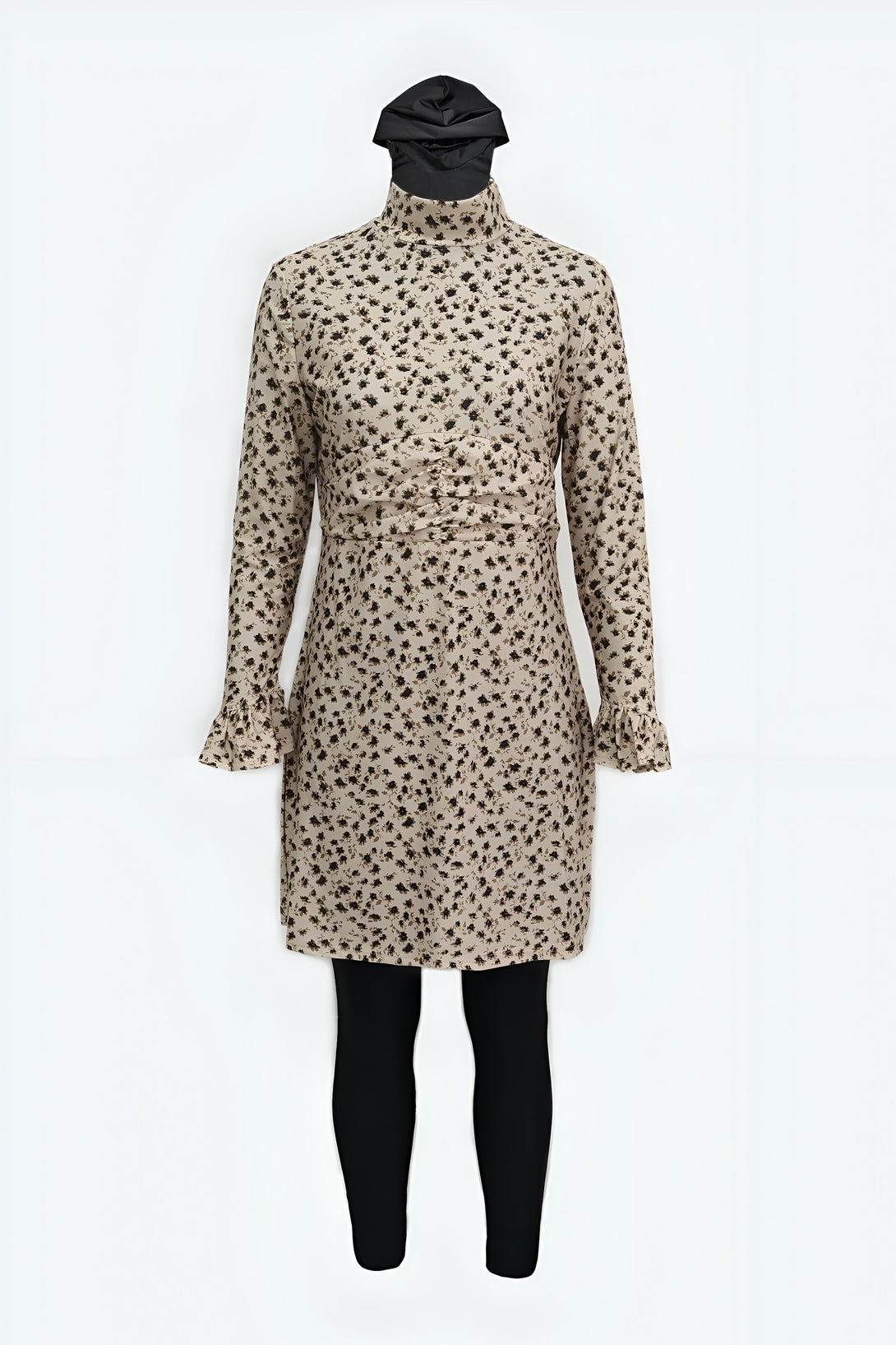 Robe longue à manches longues avec imprimé floral, col montant et leggings noirs. Parfait pour un look élégant et modeste.