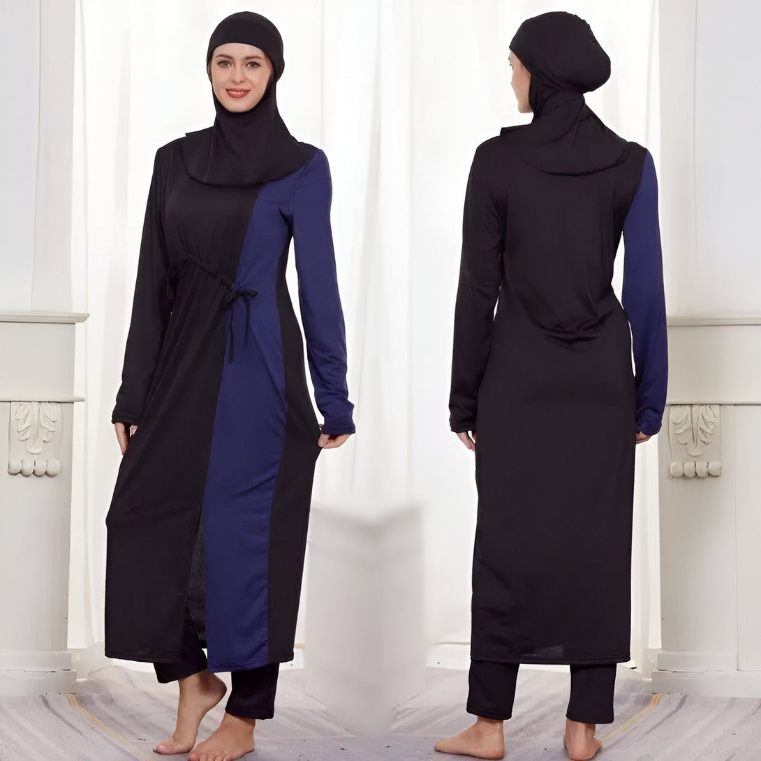 Deux femmes portant des maillots de bain musulmans noirs et bleus avec un hijab assorti.